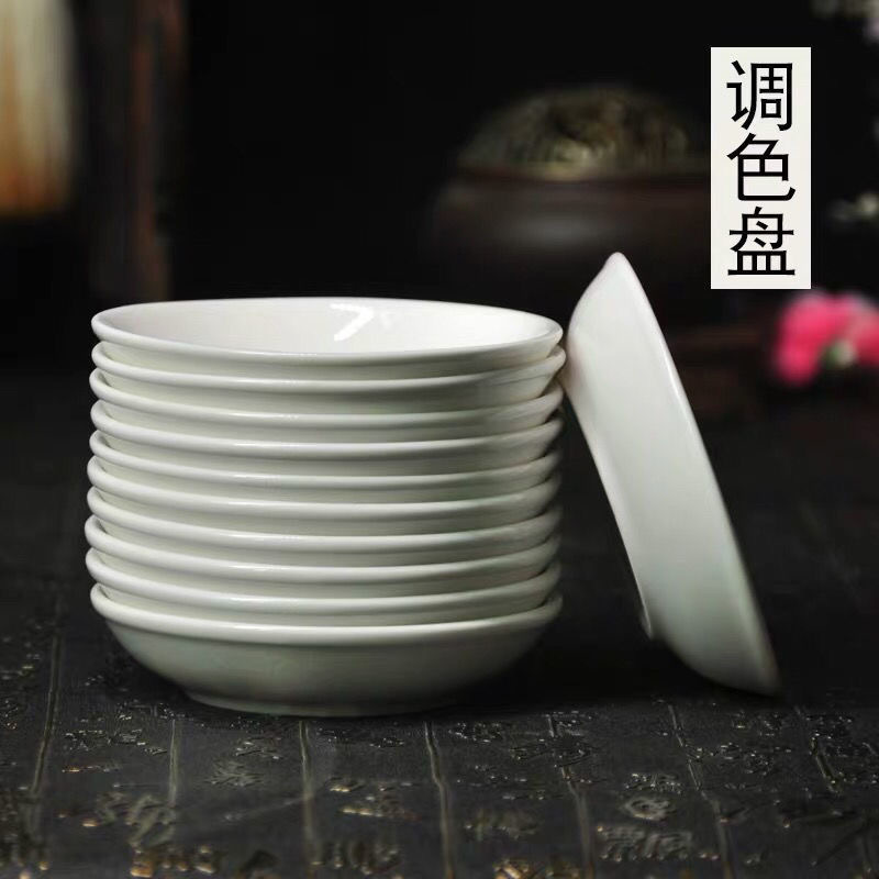 Stacked art paint dish product scene